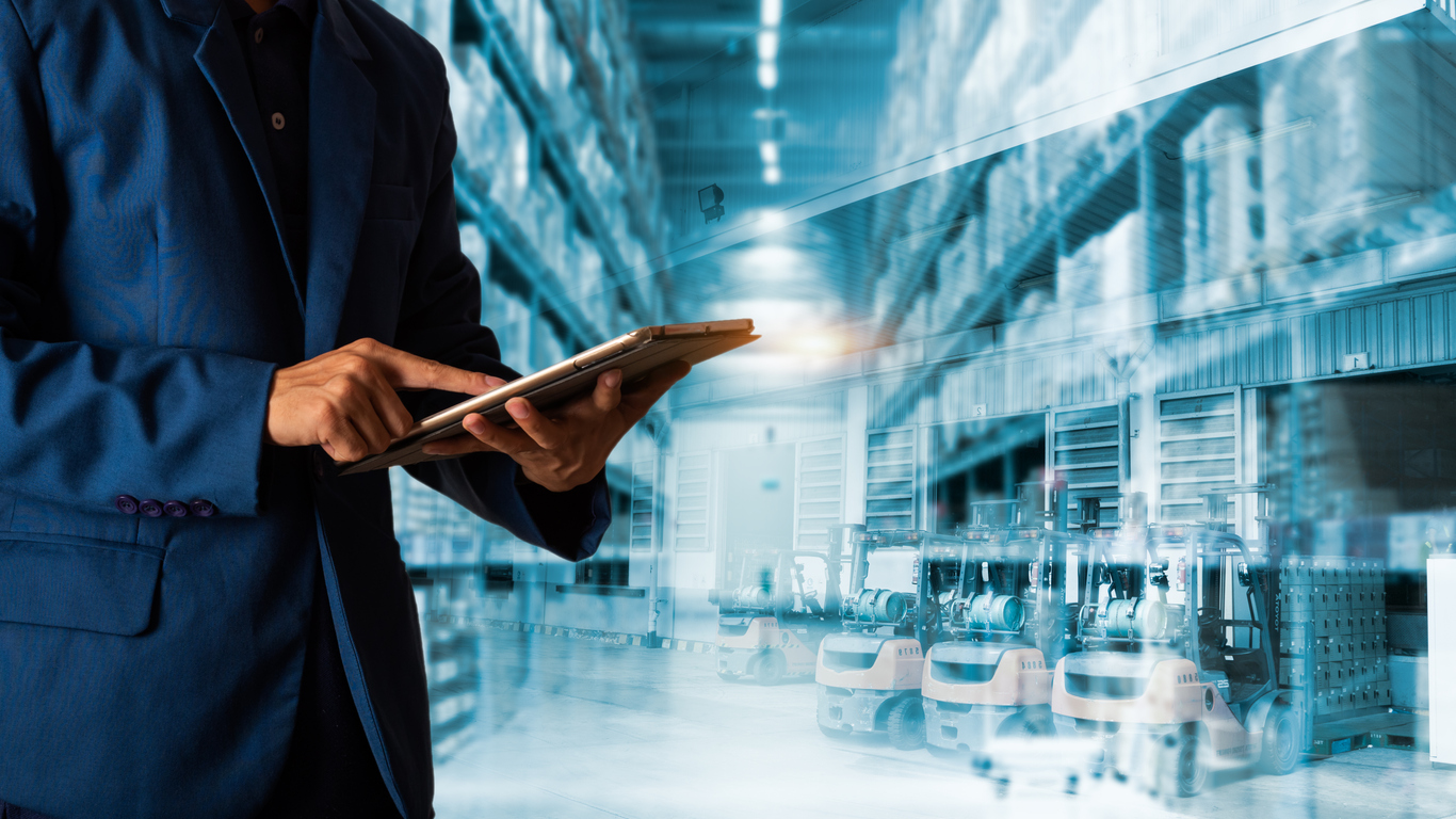 Businessman manager using tablet for Layered Process Audit Checklist PDFs